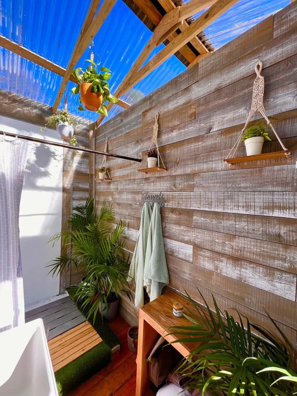 Outdoor luxury shower and bathroom at Glamping Remote